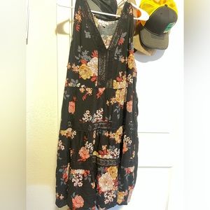 Black dress. Knee high. Tank style.